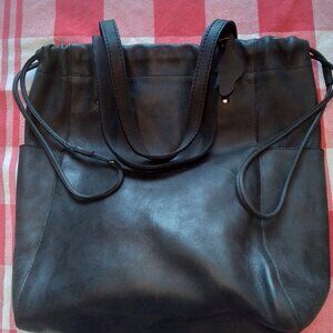 Unique special edition Roots tote bag. Black leather